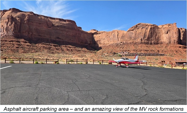 monument valley ut asphalt aircraft parking area and an amazing view of the mv rock formations