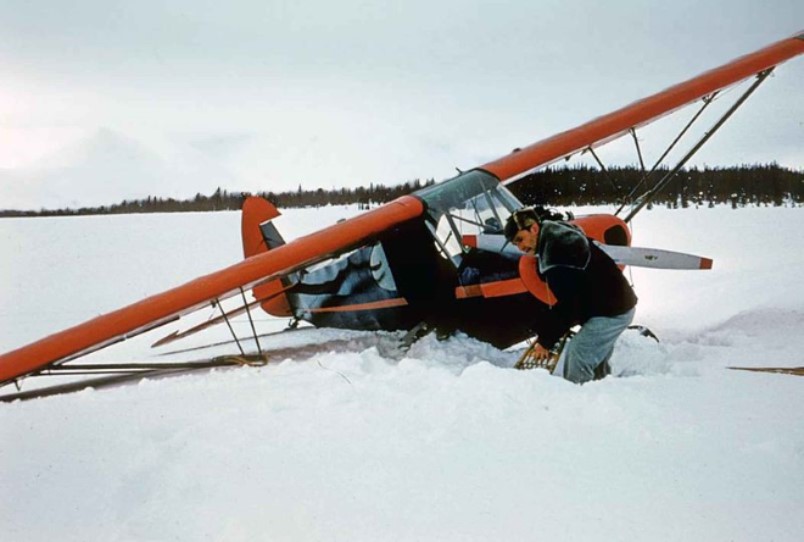 spring is just around the corner plane in snow