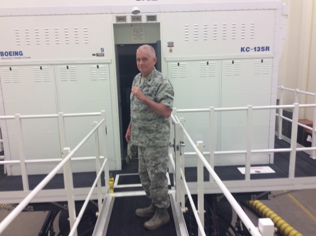flying the kc135 simulator col perrott at sim entrance
